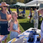 Kids examine materials at Conejo Open Space Foundation booth