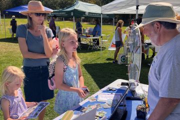 Kids examine materials at Conejo Open Space Foundation booth